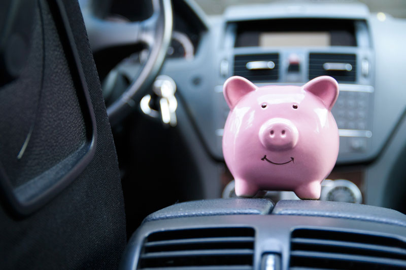A Chicago, Illinois driver in their car with new liability insurance