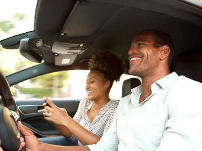 couple driving in car